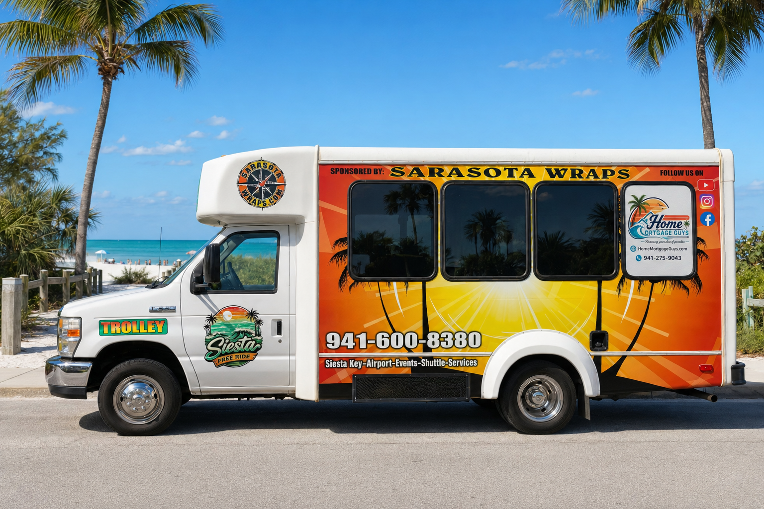 Driver side view of the Siesta Free Ride trolley near the beach