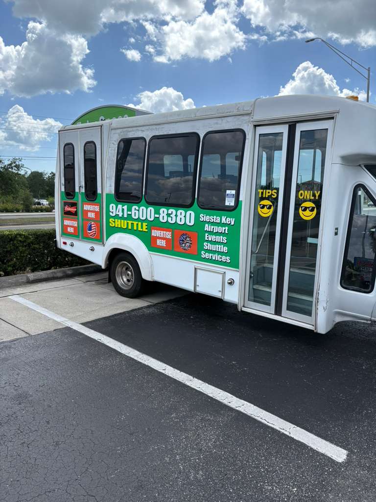 Siesta Free Ride shuttle with tropical graphics