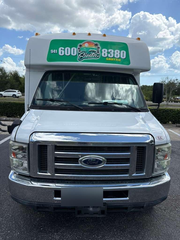 Front view of our Ford E‑Series shuttle